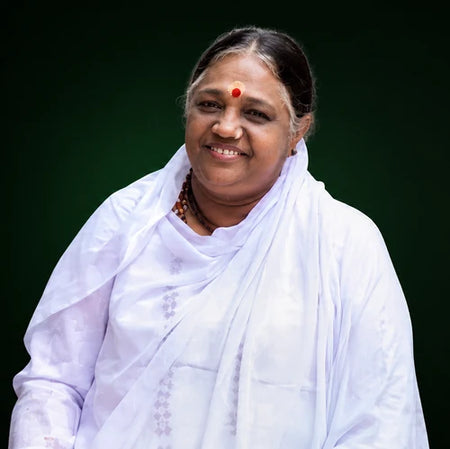 Mata Amritanandamayi smiling in white attire
