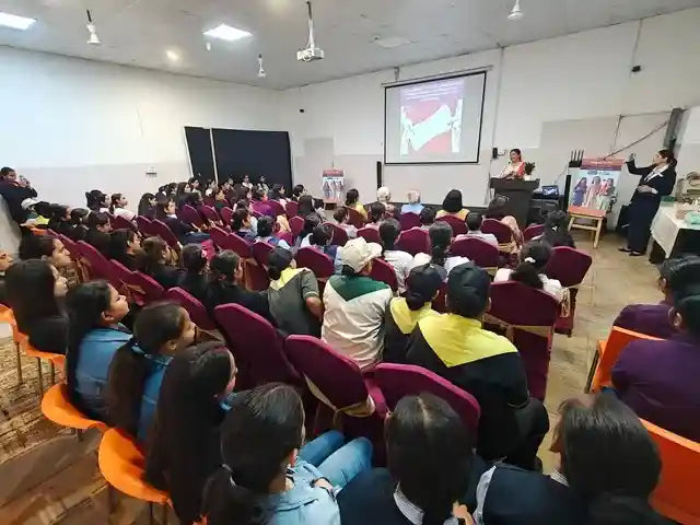 Menstrual health awareness session with students learning about reusable period care