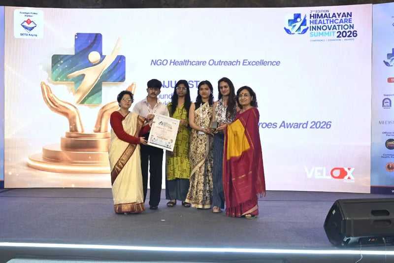 Saukhyam receiving the NGO Healthcare Outreach Excellence Heroes Award