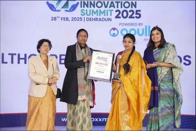 Saukhyam receiving the Rural Healthcare Organization of the Year award