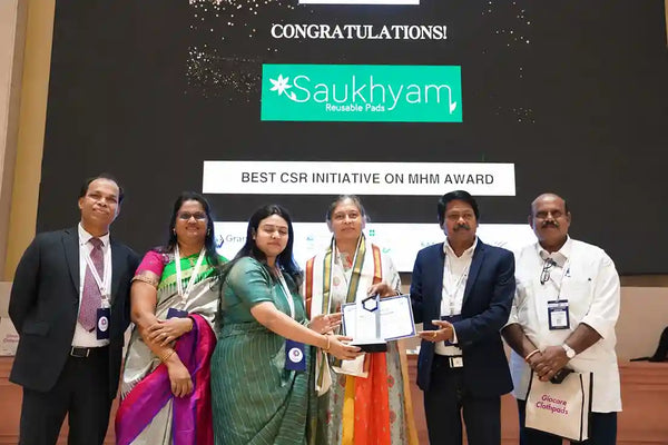 Saukhyam team receiving a CSR initiative award