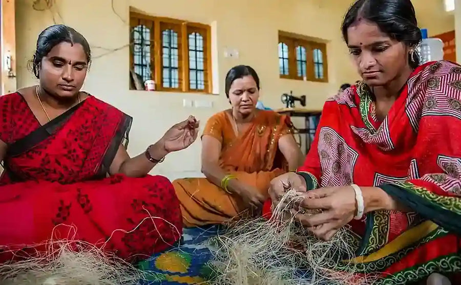 Women working together with natural fiber materials